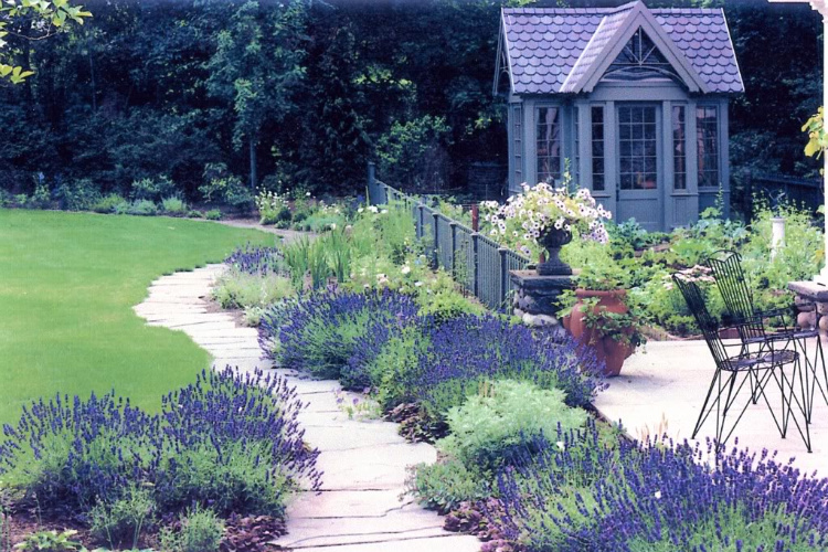 Flowers along walkway of private home